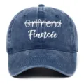 Close-up of white Fiancée embroidery on a vintage washed blue denim baseball cap - Adjustable / Navy Blue (Fiancee)