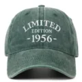 Detailed front view of a washed green 1956 limited edition embroidered birthday gift baseball cap - Grass Green