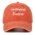 Close-up of vintage washed orange baseball cap with white Fiancée embroidery. - Adjustable / Orange (Fiancee)
