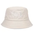 Detail view of a vintage beige cotton bucket hat featuring white Gigi letter embroidery - Adjustable / Off White