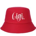 Detailed view of a vibrant red cotton bucket hat with white Gigi embroidery design - Adjustable / Rose Red
