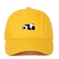 Detailed view of yellow cotton baseball cap with cute panda embroidery on the front. - Adjustable / Yellow