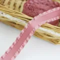 Pink ruffled satin ribbon detail view, pleated fabric trim for gift wrapping crafts. - Flesh Pink