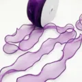 Detailed view of the purple organza ribbon showing fine edge stitching and sheer texture. - 6cm 4.5M/Roll / Purple