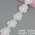 Close up of white water soluble lace trim, floral embroidered ribbon, 35mm width, 1 yard. - 35mm Width (Model 2)