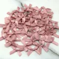 Pink satin ribbon bows 4x4cm, ideal for DIY crafts and clothing sewing decor variant. - 50 Sheets per Pack / Flesh Pink