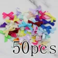 50pcs colorful ribbon bows for DIY crafts, sewing, clothing decoration, and gift wrapping. - 50 Sheets per Pack / Multicolor