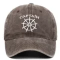 Front view detail of a vintage washed cotton baseball cap with Captain embroidery - Adjustable / Coffee