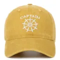 Front view of yellow washed baseball cap with white Captain embroidery - Adjustable / Yellow