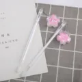 Lindo bolígrafo de gel con colgante de flor de cerezo y lentejuelas de corazón rosa - Punta de bolígrafo de 0,5 mm / Blanco