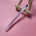 Minimalist transparent frosted gel pen with black ink, leaning on wooden easel. - 0.5mm / 50 Pieces/Pack / Black