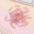 Pink coated metal paper clips detail shot, great for office supplies and bookmarks. - 50mm Macaron Pink Bulk