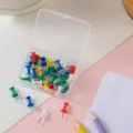 Colorful push pins in a clear plastic storage box, 35 pieces per set, office stationery. - Solid Multicolor