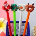 Set of 4 Christmas gel pens featuring Santa, snowman, reindeer and wreath toppers. - Christmas Donut Pen / 0.7mm