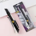 Heavy duty utility knife with 18mm SK5 wide blade, ergonomic black white handle for cutting. - Craft Knife