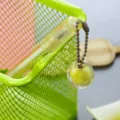 Creative aesthetic green gel pen with a sparkling faceted yellow disco ball pendant charm - 0.5mm / Yellow