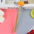 Gold electroplated massage roller gel pen for stress relief with orange silicone massager - 0.5mm / Gold