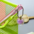 Creative pink gel pen featuring a dazzling iridescent disco ball charm and needle tip - 0.5mm / Purple