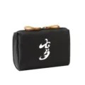 Close-up detail of the black makeup bag zipper pulls and fabric texture for travel use. - 16*10*5CM / Black Qixi Festival