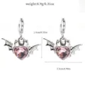 Detail view of silver devil bat wing pink heart crystal earrings with dimension specs. - 8