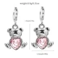 Detailed view of the cute pink heart crystal bear earrings, showing precise size and weight. - 17