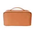 Detailed close-up of brown PU leather cosmetic bag zipper and handle design texture. - Blank No-Logo Coffee Brown