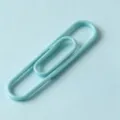 Light blue plastic-coated large paperclip for office stationery, book storage and cute bookmarks. - 28mm Macaron Green