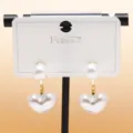 Elegant double pearl heart earrings with gold metal connector, chic daily jewelry accessory. - C-596 Gold