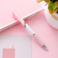 Penna a scatto bianca minimalista con comoda impugnatura rosa per scuola e ufficio - 0.5mm / Corpo Rosa Inchiostro Nero