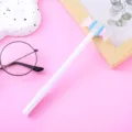 Bolígrafo de gel blanco creativo con un lindo adorno de caramelo sobre fondo rosado - 0.5mm / Blanco