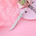 Creative sword-shaped gel pen with silver metallic dragon design on pink background - Silver Dragon Sword