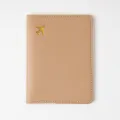 Beige leather passport cover with gold airplane stamp and white edge stitching travel holder - Beige Apricot