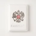 White PU leather passport cover with metal double-headed eagle badge and passport lettering. - White