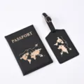 Detail shot of black PU leather passport holder and luggage tag set with gold world map. - Black