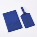 Blue PU passport cover and luggage tag set with world map debossed design for travel. - Dark Blue