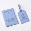 Blue PU leather passport cover and luggage tag set detail shot, minimalist travel accessories. - Light Blue
