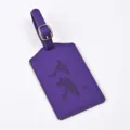 Purple PU leather luggage tag featuring an embossed world map design and secure buckle strap. - Purple
