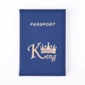 Blue PU leather passport cover detail showing gold foil crown and text stamping. - Dark Blue