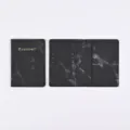 Detailed view of black marble passport holder showing gold text and card slots interior. - Black