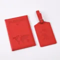 Red PU leather passport holder and luggage tag travel set with world map debossed design. - Bright Red
