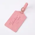 Pink PU leather luggage tag with embossed travel quote and metal buckle, durable travel accessory. - Pink