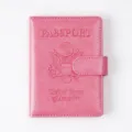 Pink PU leather passport holder with RFID blocking, magnetic closure and stylish embossed design. - Pink
