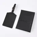 Black PU leather passport cover and luggage tag set with embossed adventure quotes for travel. - Black