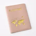 Close-up of pink PU leather passport cover with gold world map design and clear stitching. - 14.2*10.8cm / Pink