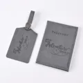Grey PU leather passport cover and luggage tag set with embossed adventure text detail. - Gray