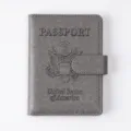 Grey PU leather passport cover with RFID blocking, magnetic closure and embossed USA seal design. - Gray