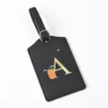 Black leather travel luggage tag with golden letter A design, ideal for suitcase identification. - Letter A / Black