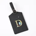 Black leather luggage tag featuring a gold letter D design, cute travel charms and durable strap. - Letter D / Black