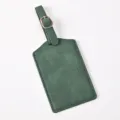 Dark green PU leather luggage tag detail shot, durable travel accessory card holder for suitcases. - Luggage Tag / Green
