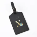 Black leather luggage tag with gold letter X and travel icon, durable strap for suitcases. - Letter X / Black